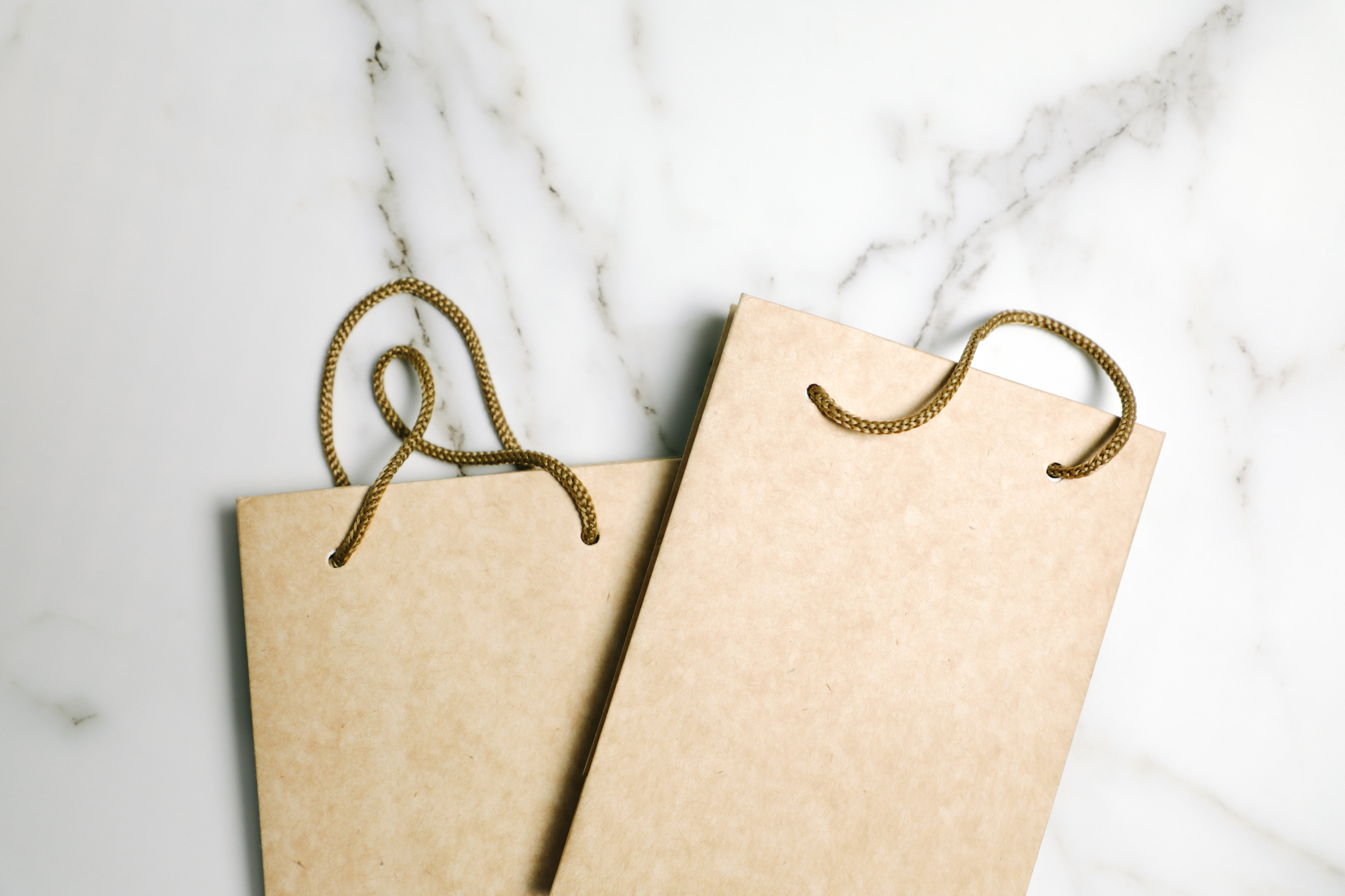 Paper Bags on Marble Background